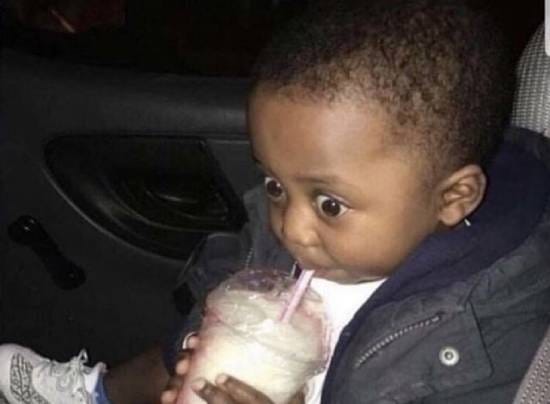 Shocked kid sipping a milkshake Shocked kid sipping a milkshake