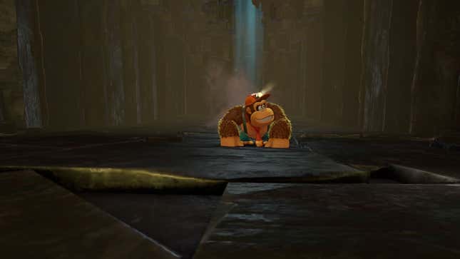 Donkey Kong smiles in a barren cave after he rocked its shit.