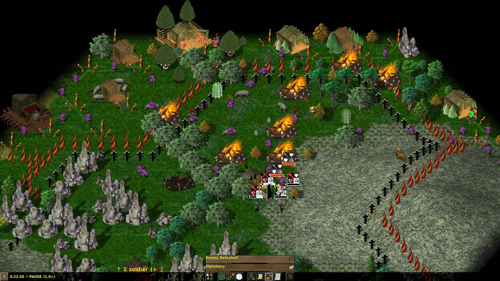 Burning and destroyed residential buildings in Widelands.