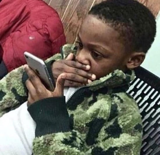 Surprised individual looking at phone