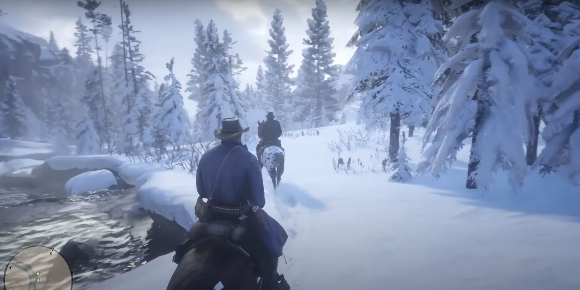 Riding through the snowy biome of Red Dead Redemption 2 on horseback.