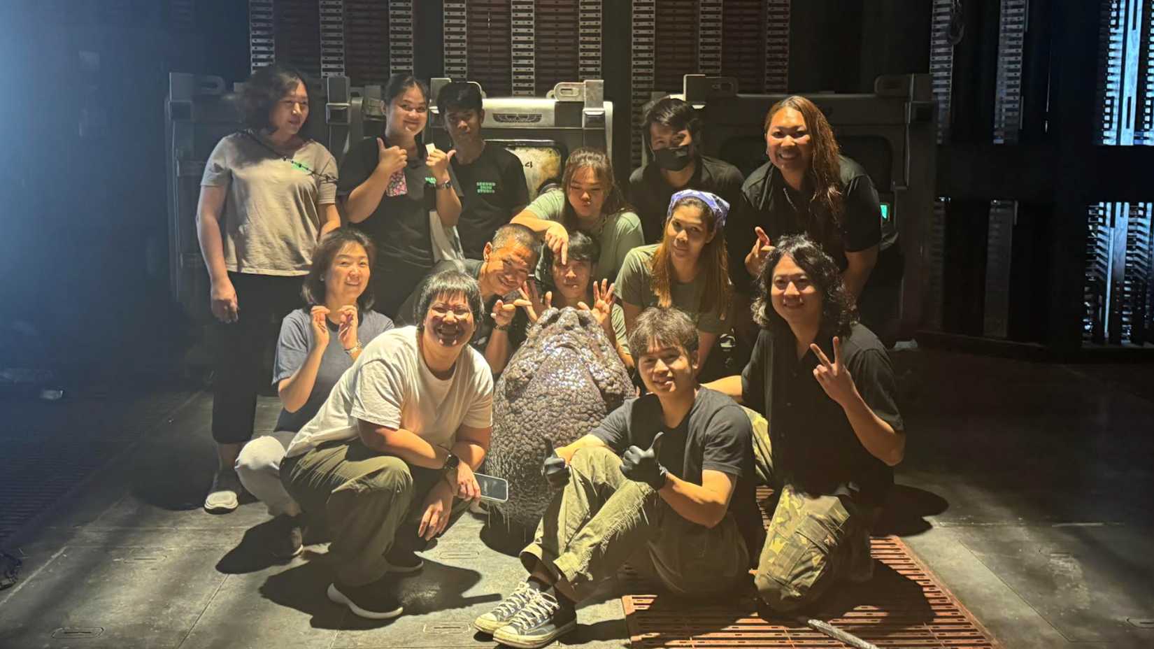 The Second Skin Studio crew smiles on the set of Alien: Earth.