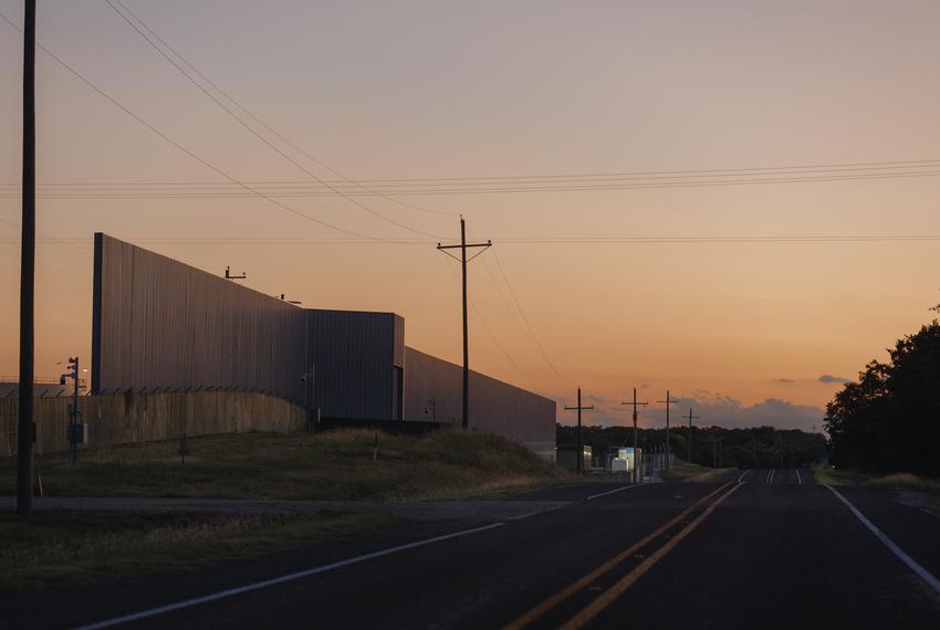 A 24-foot tall soundproofing wall separates the Marathon cryptocurrency facility’s computers from neighboring resident’s homes and land in Hood County on September 24, 2025. Residents say it has done little to reduce “the roar”, the hum that is generated by fans cooling the cryptomining computers.
