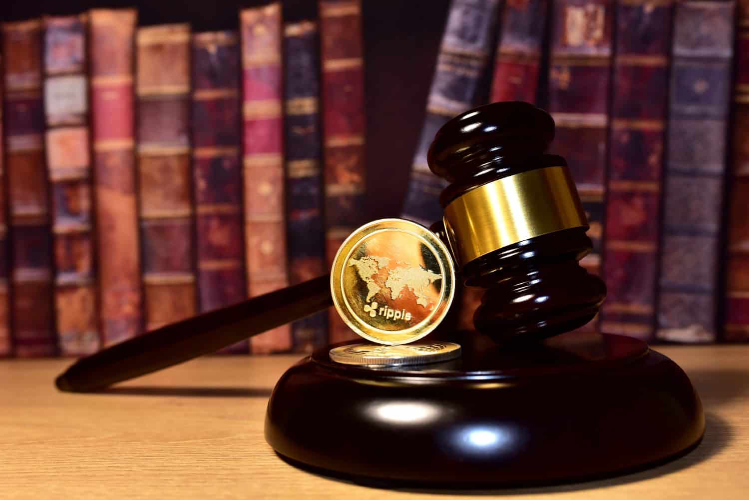 Judge hammer and XRP crypto coin. Justice courtroom. Ripple demands Bitcoin and Ethereum docs from SEC amid legal fight. Delist cryptocurrency trading. Exchanges and traders. law to ban blockchain